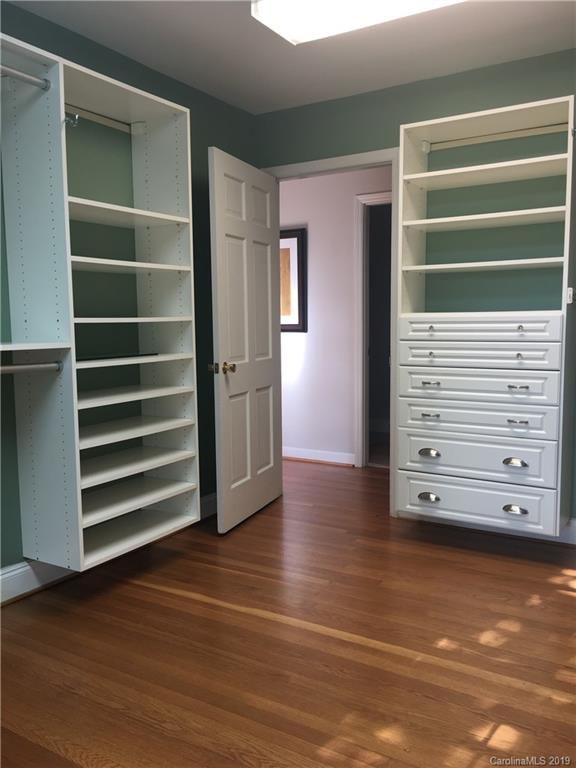 6418 Sardis Road Charlotte, NC 28270 - Photo 27 of 35 a view of walk in closet with empty racks