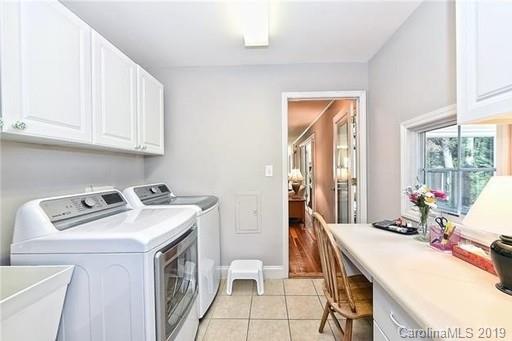 6418 Sardis Road Charlotte, NC 28270 - Photo 28 of 35 a room with a sink a stove and a table