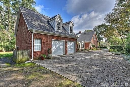 6418 Sardis Road Charlotte, NC 28270 - Photo 5 of 35 a front view of a house with garden