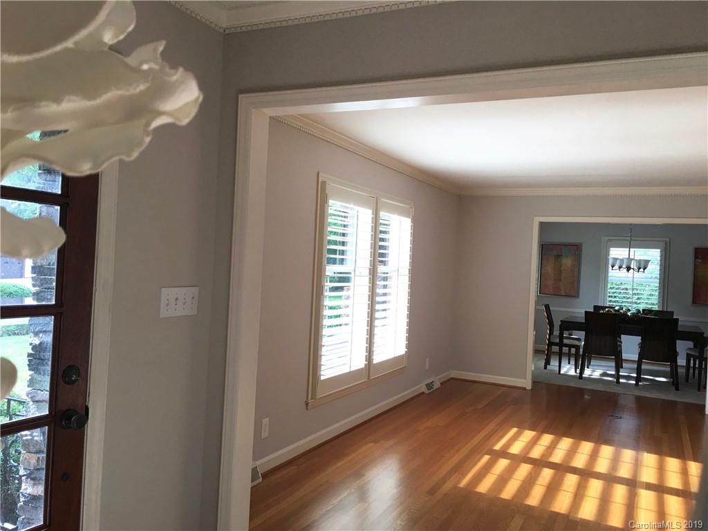 6418 Sardis Road Charlotte, NC 28270 - Photo 7 of 35 a view of a livingroom with furniture window and wooden floor