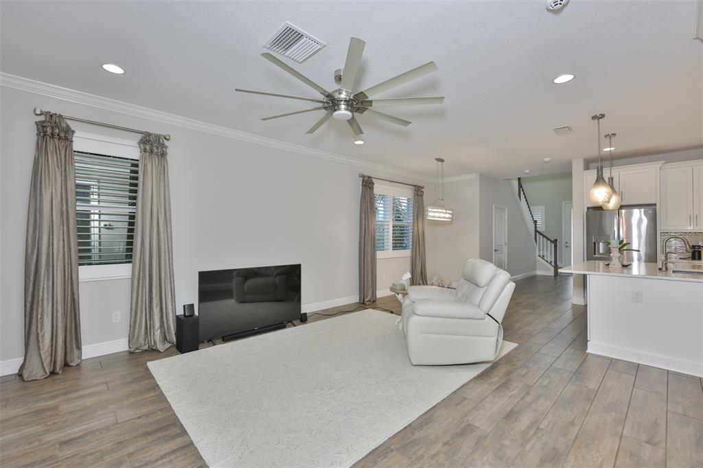 2262 Spring Lake Clearwater, FL 33763 - Photo 11 of 51 a living room with furniture and a flat screen tv