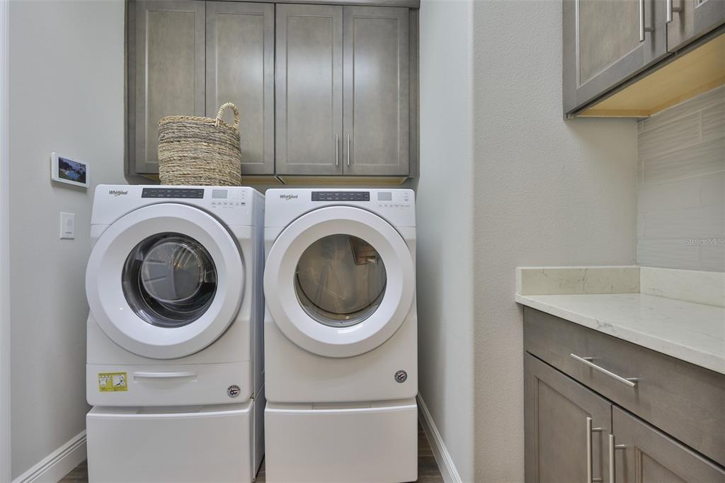 2262 Spring Lake Clearwater, FL 33763 - Photo 16 of 51 a utility room with dryer and washer