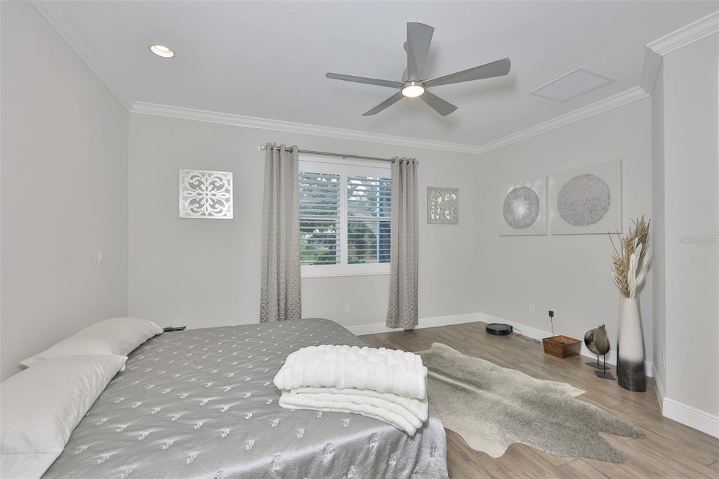2262 Spring Lake Clearwater, FL 33763 - Photo 17 of 51 a bedroom with a bed and a window