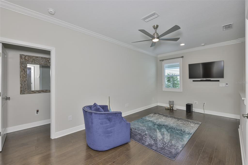2262 Spring Lake Clearwater, FL 33763 - Photo 27 of 51 a living room with furniture and a flat screen tv