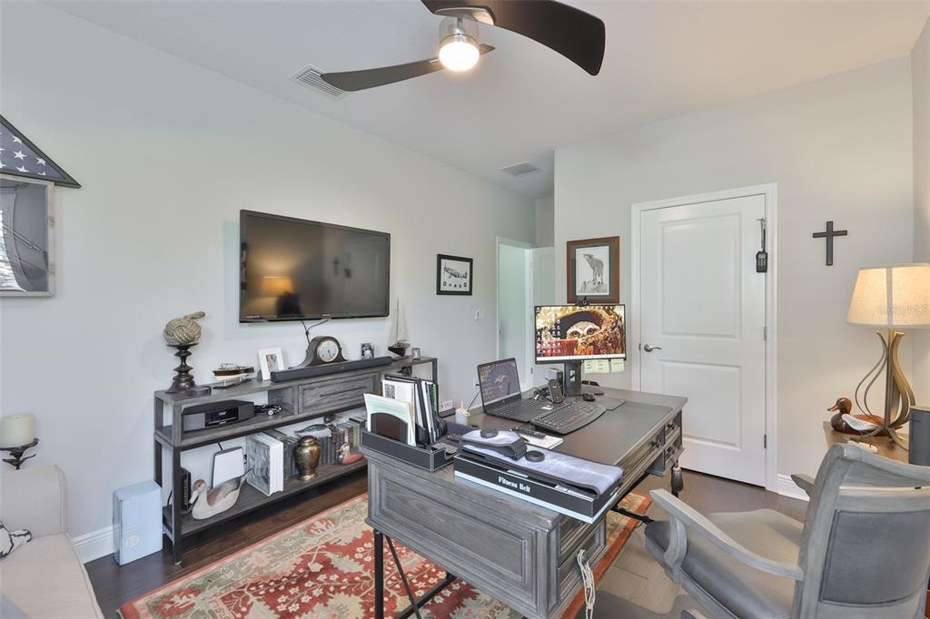 2262 Spring Lake Clearwater, FL 33763 - Photo 31 of 51 a living room with furniture and a flat screen tv