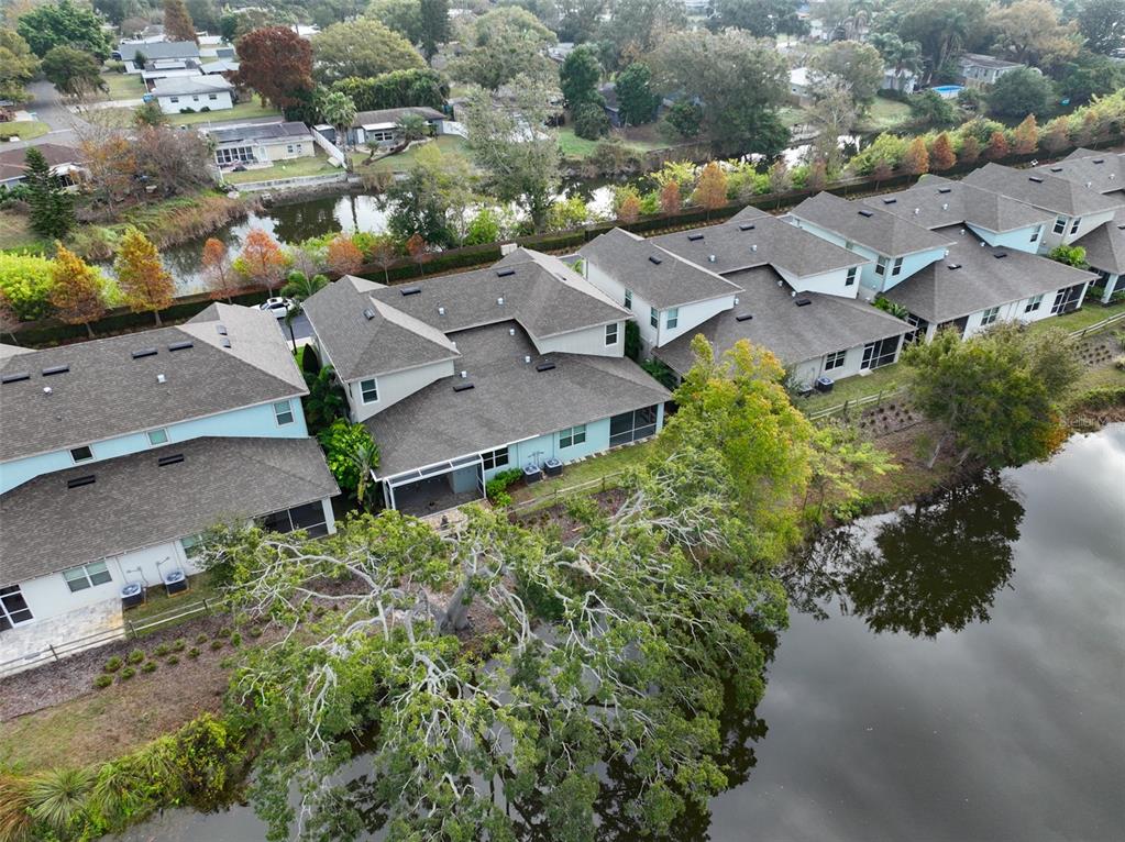 2262 Spring Lake Clearwater, FL 33763 - Photo 48 of 51 an aerial view of multiple houses with yard