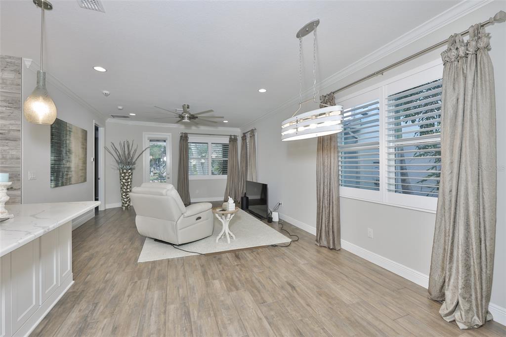 2262 Spring Lake Clearwater, FL 33763 - Photo 9 of 51 a view of kitchen and dining room with wooden floor