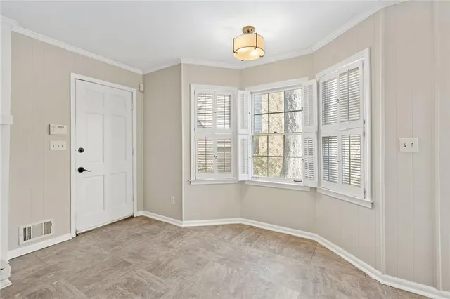 an empty room with windows