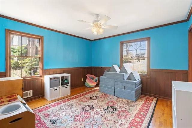 a bedroom with a workspace