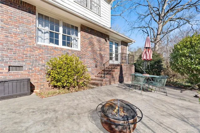 a view of a house with a patio