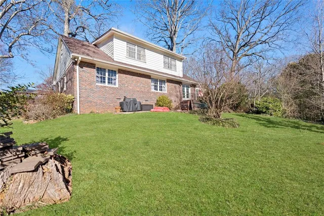 a view of a yard in front of a house