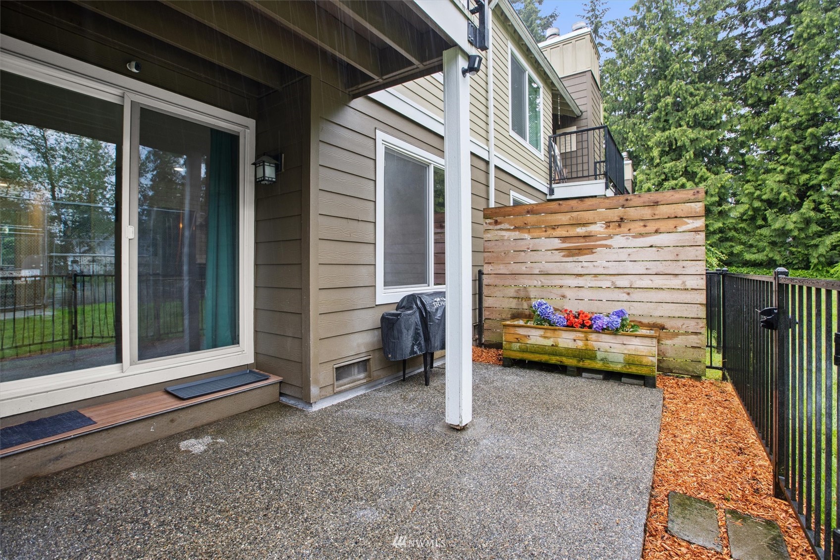 820 Cady Road, Unit D104 Everett, WA 98203 - Photo 20 of 27 a view of car parked in front of a house