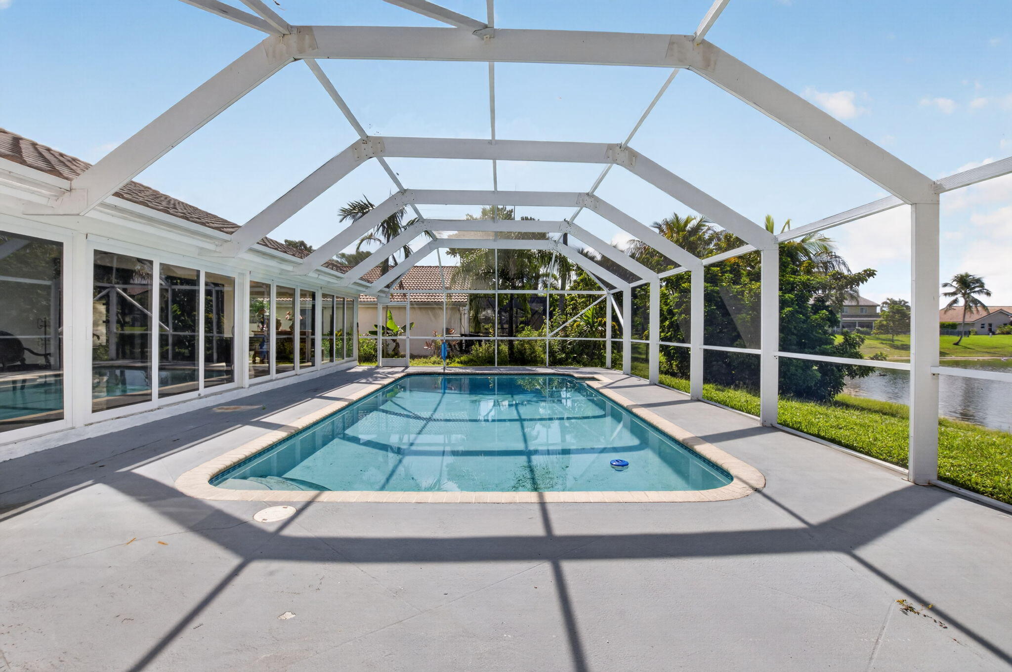 11845 Island Lakes Lane Boca Raton, FL 33498 - Photo 70 of 78 Long pool view extended patio