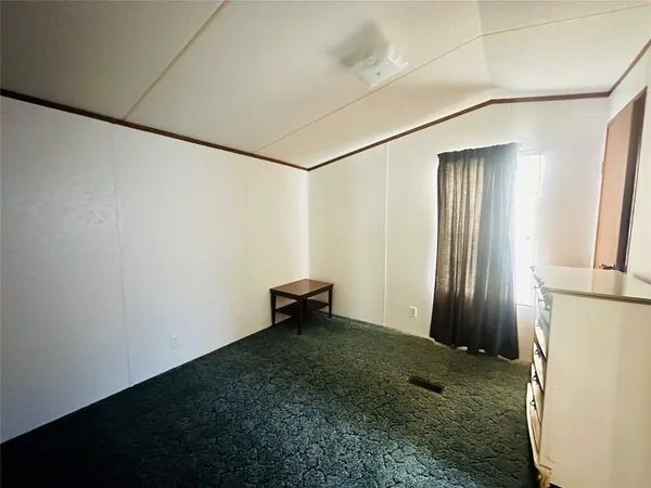 an empty room with a door