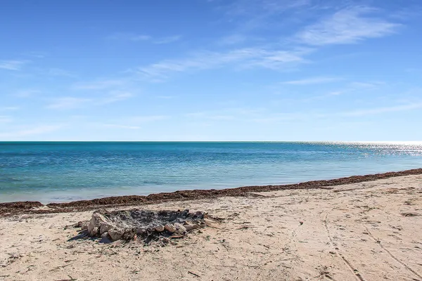 a view of beach and ocean