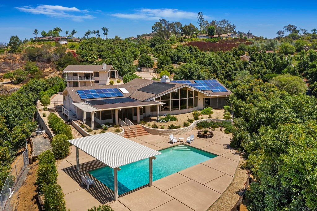 2627 Via Oeste Drive Fallbrook, CA 92028 - Photo 2 of 41 an aerial view of a house with swimming pool and yard