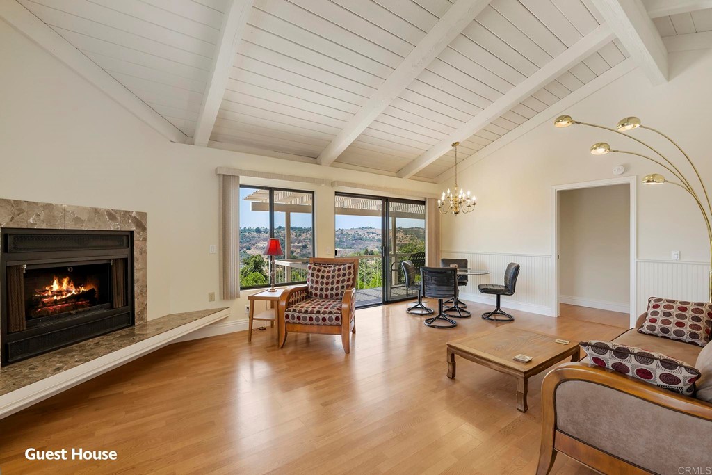 2627 Via Oeste Drive Fallbrook, CA 92028 - Photo 20 of 41 a living room with furniture and a fireplace