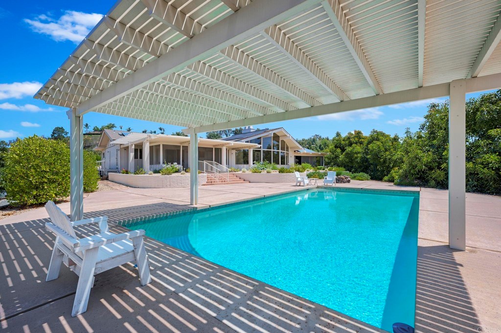 2627 Via Oeste Drive Fallbrook, CA 92028 - Photo 3 of 41 a view of a swimming pool with a patio