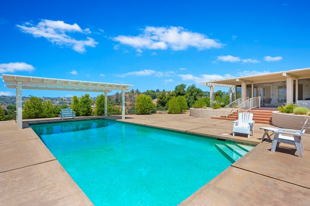2627 Via Oeste Drive Fallbrook, CA 92028 - Photo 27 of 41 a view of a swimming pool with a patio