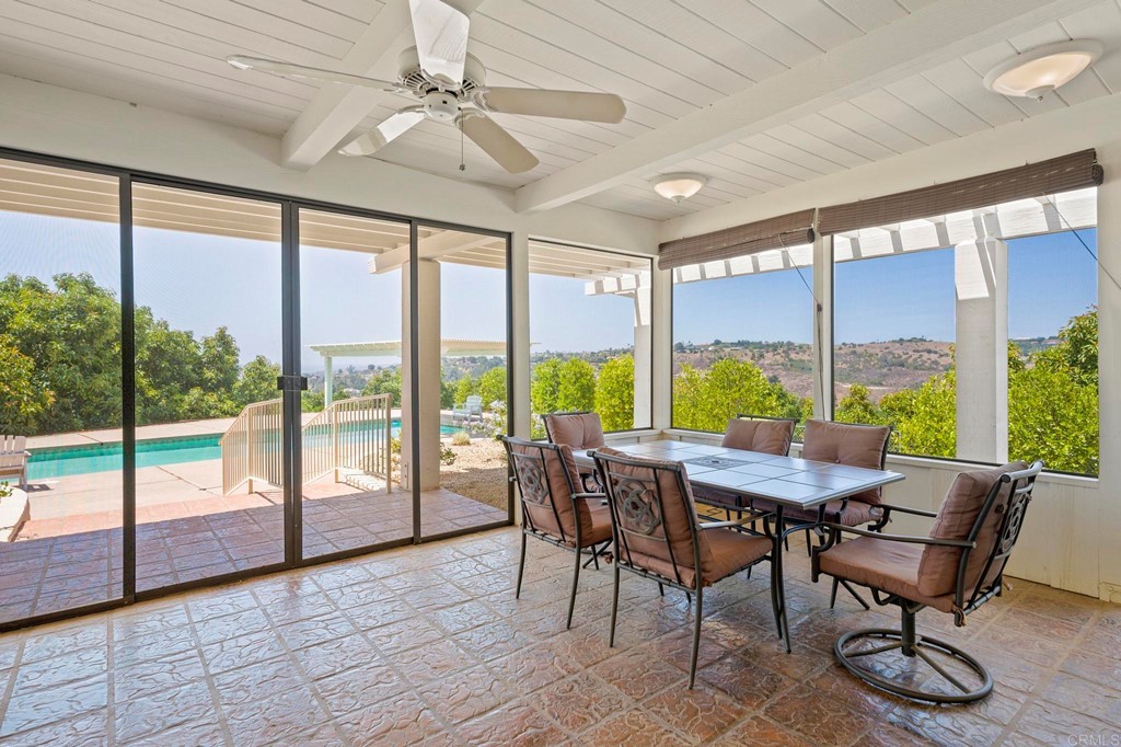 2627 Via Oeste Drive Fallbrook, CA 92028 - Photo 9 of 41 a view of a dining room with furniture window and outside view