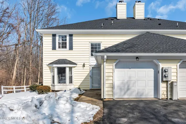 a view of a house with a snow