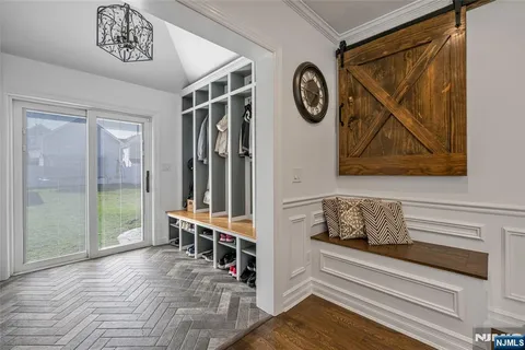 a room with lawn chairs and a large window