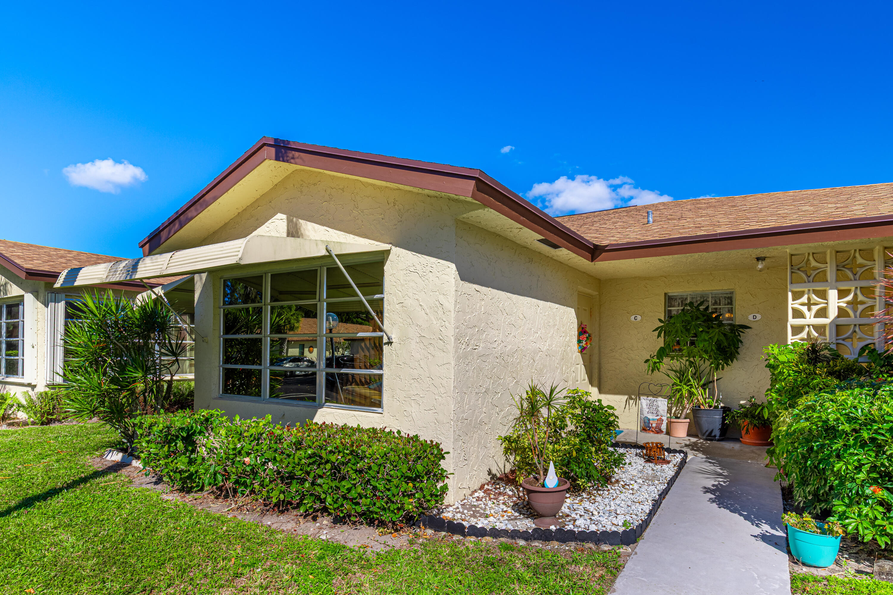 5230 Nesting Way, Unit C Delray Beach, FL 33484 - Photo 4 of 39 Front of Home