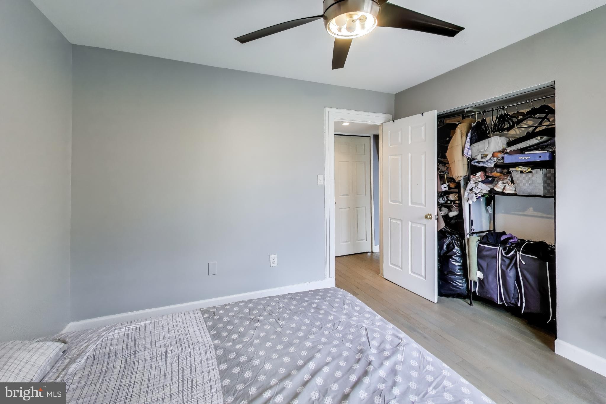 3206 Spartan Road, Unit 17 Olney, MD 20832 - Photo 18 of 28 a view of a bedroom with a furniture and closet