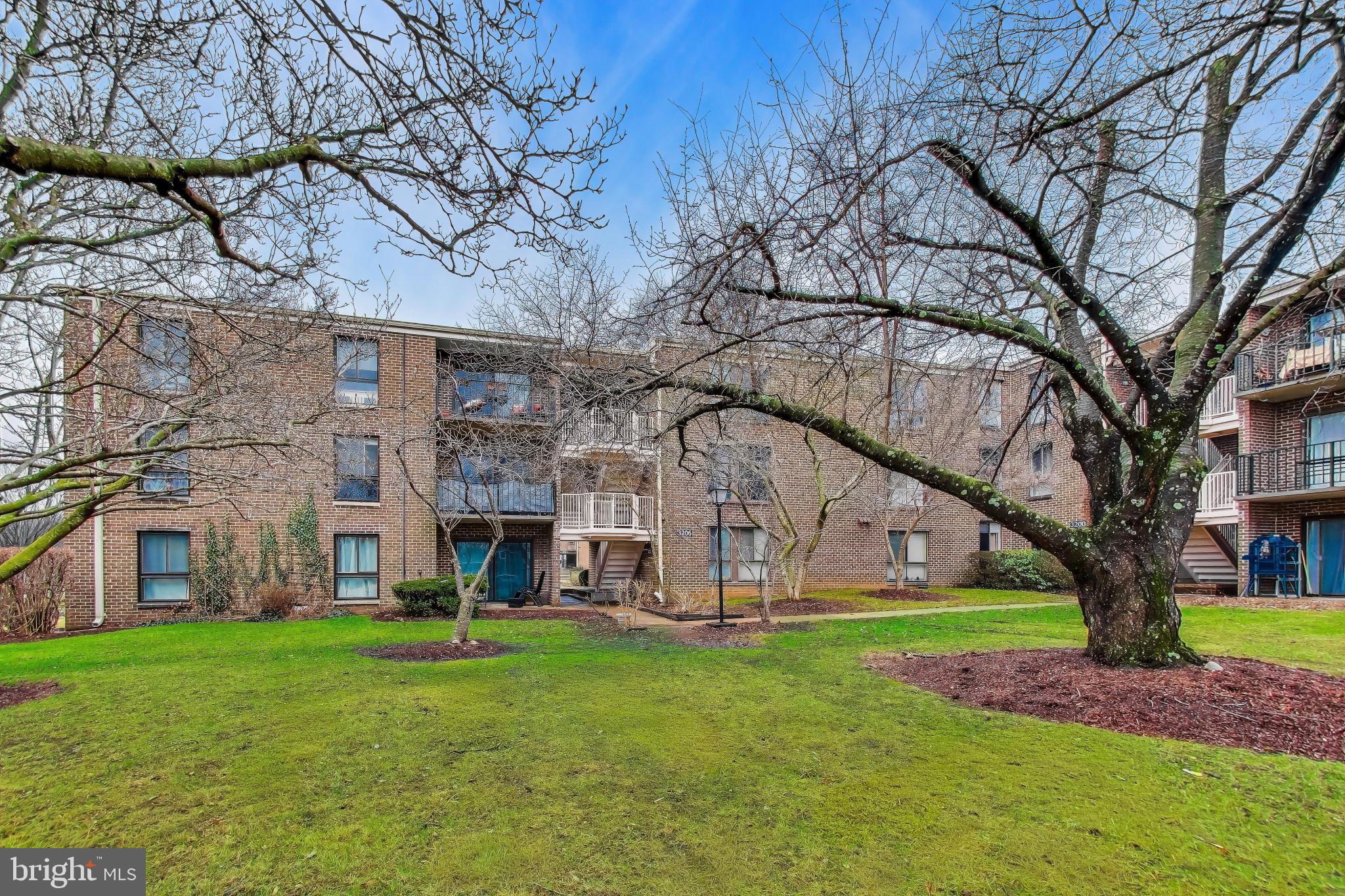 3206 Spartan Road, Unit 17 Olney, MD 20832 - Photo 24 of 28 a view of a yard in front of house