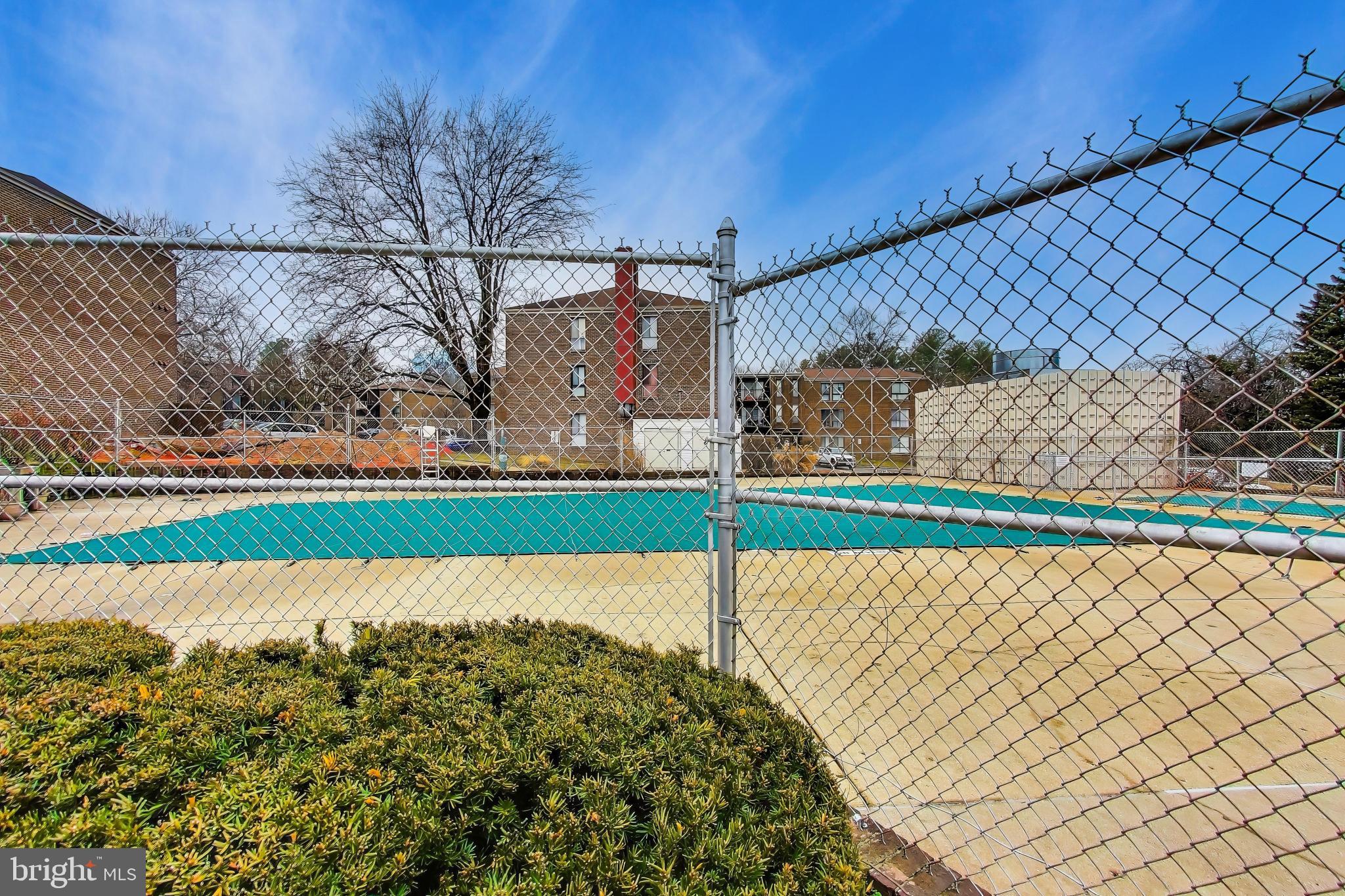 3206 Spartan Road, Unit 17 Olney, MD 20832 - Photo 28 of 28 a view of a road with a yard