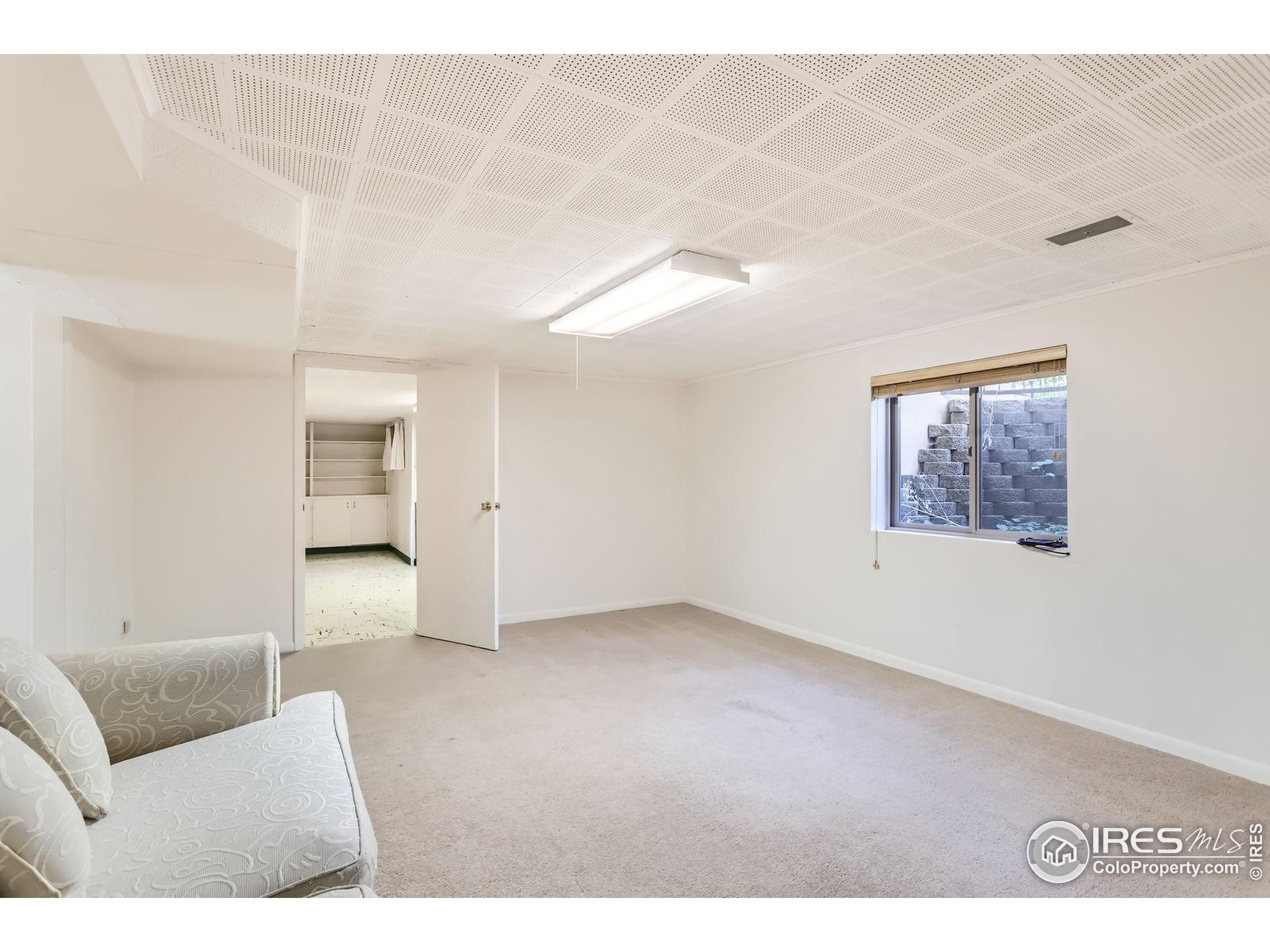 360 20th Street Boulder, CO 80302 - Photo 22 of 31 a view of an empty room with a window