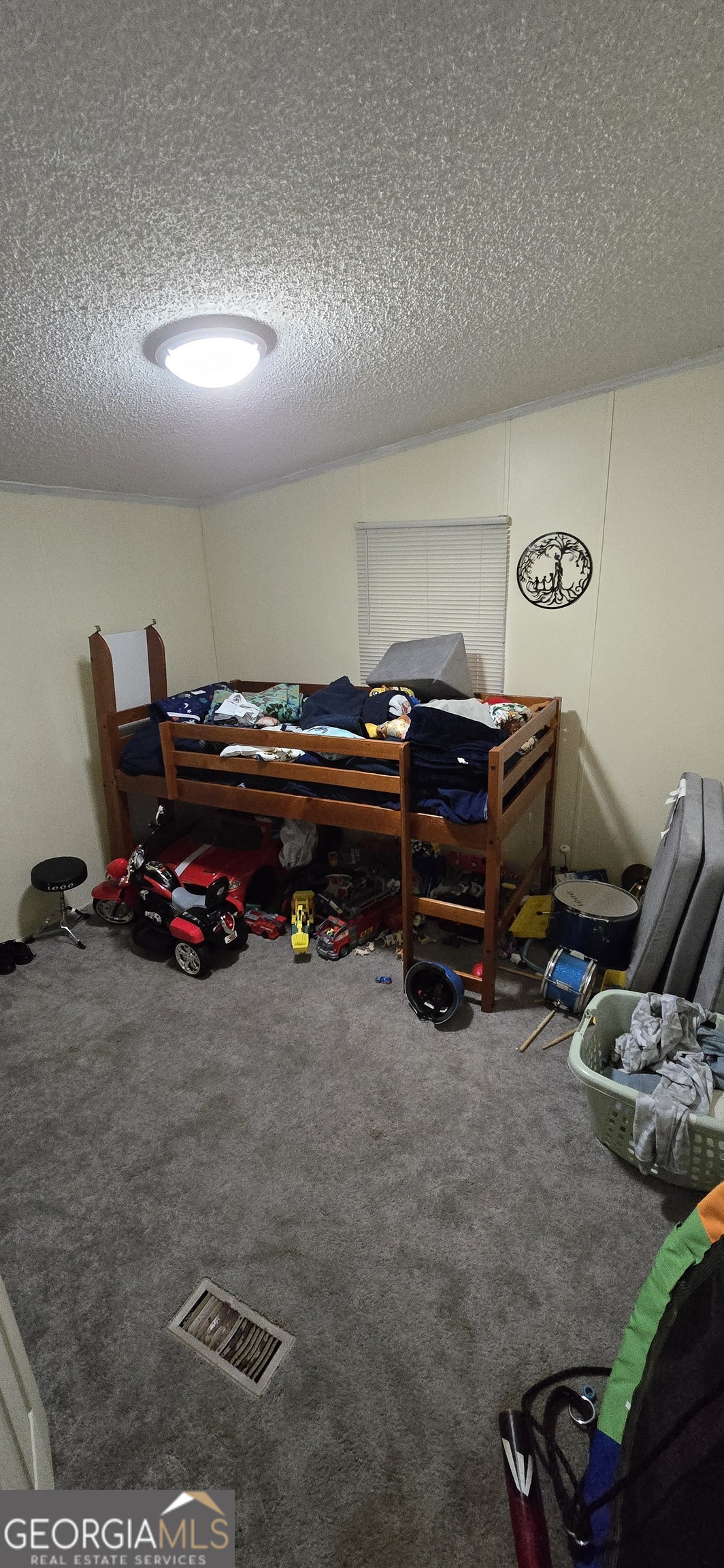 352 Jeffrey Way Forsyth, GA 31029 - Photo 11 of 12 a room with furniture