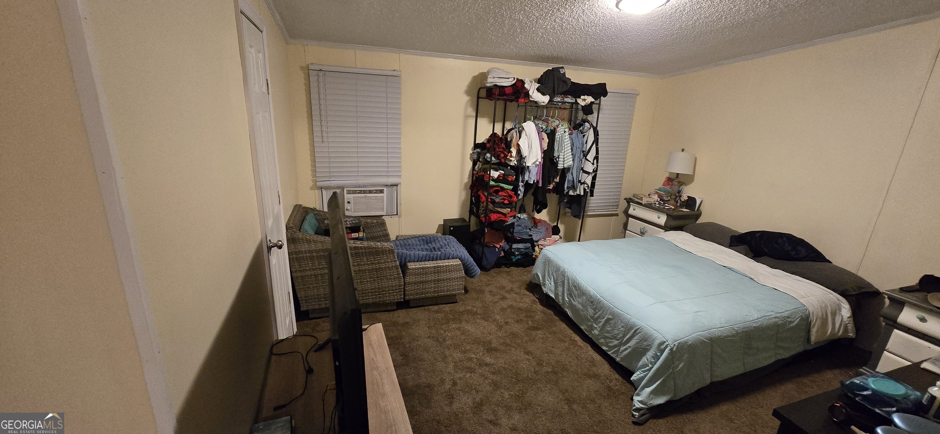 352 Jeffrey Way Forsyth, GA 31029 - Photo 8 of 12 a bed room with two bed and a closet