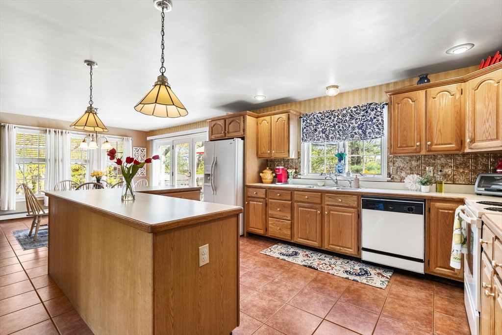 8 Oxford Road Gloucester, MA 01930 - Photo 12 of 35 a kitchen with sink cabinets and window