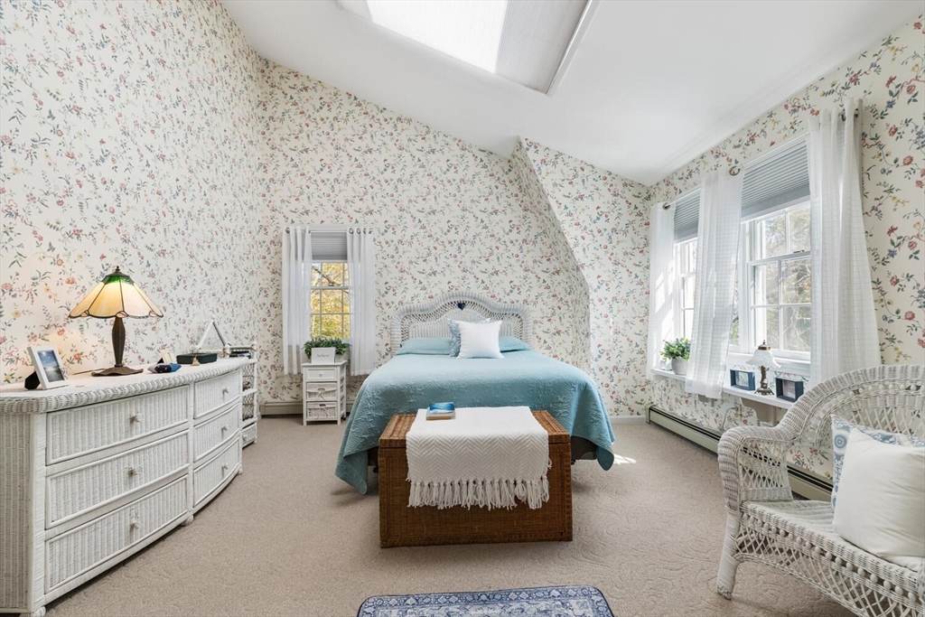8 Oxford Road Gloucester, MA 01930 - Photo 23 of 35 a spacious bedroom with a bed and window