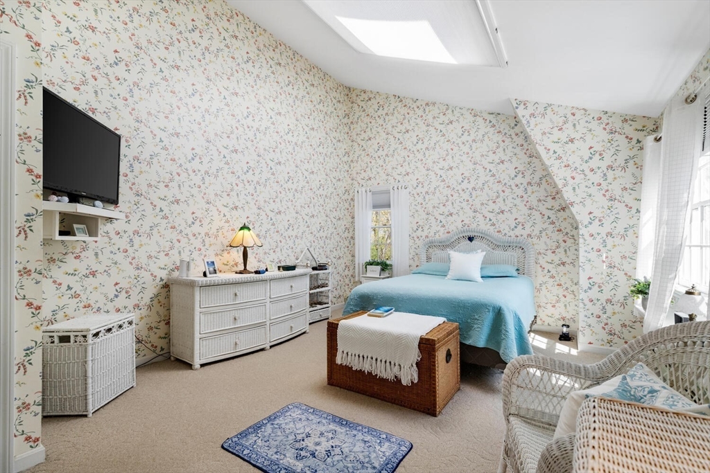 8 Oxford Road Gloucester, MA 01930 - Photo 24 of 35 a bedroom with a bed and a flat screen tv