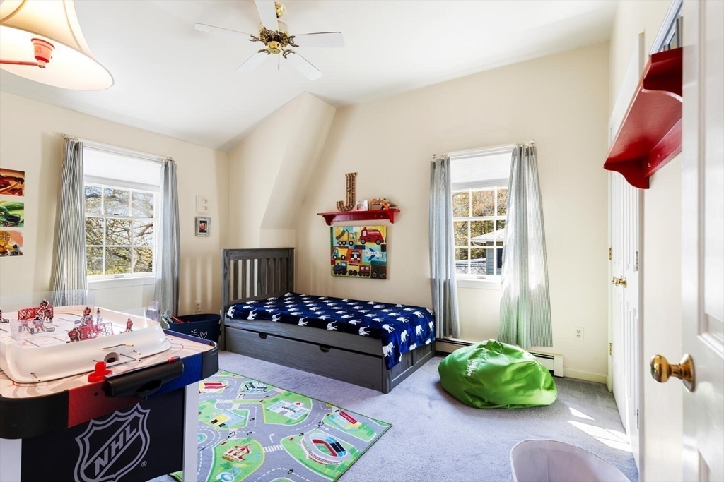 8 Oxford Road Gloucester, MA 01930 - Photo 26 of 35 a bedroom with furniture and a window