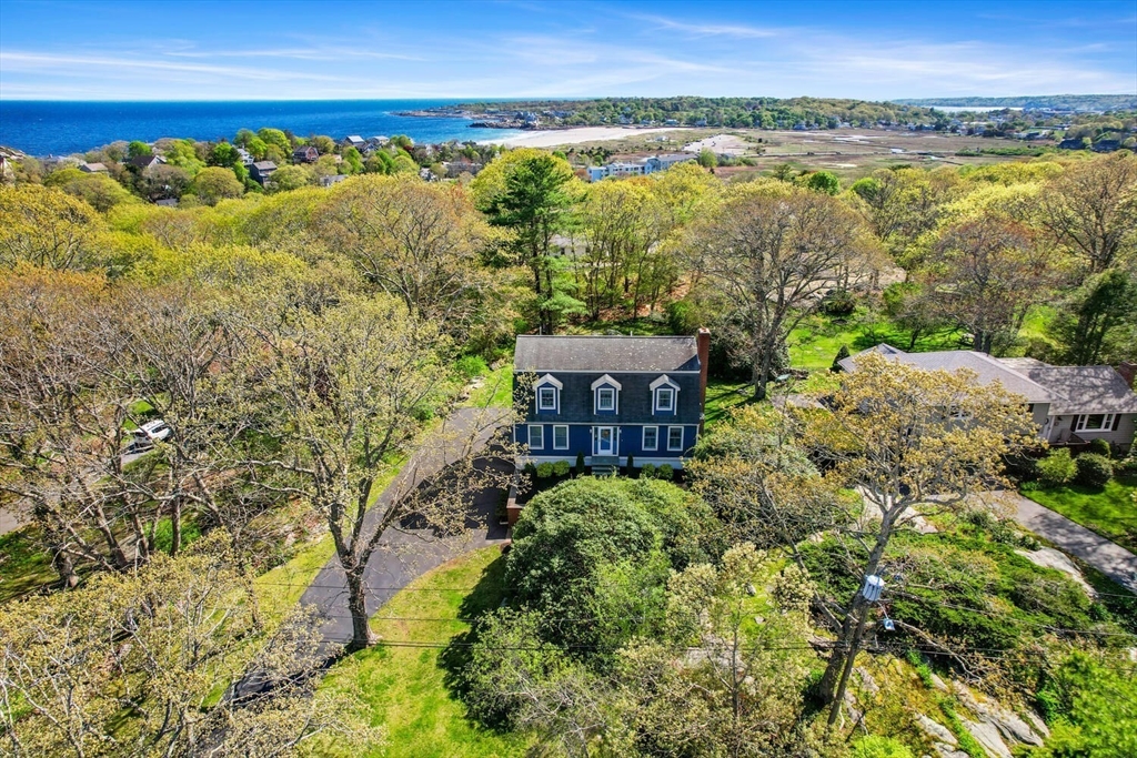 8 Oxford Road Gloucester, MA 01930 - Photo 3 of 35 a view of a lake with a mountain in the background