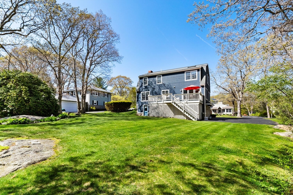 8 Oxford Road Gloucester, MA 01930 - Photo 34 of 35 a view of a house with a big yard and large trees