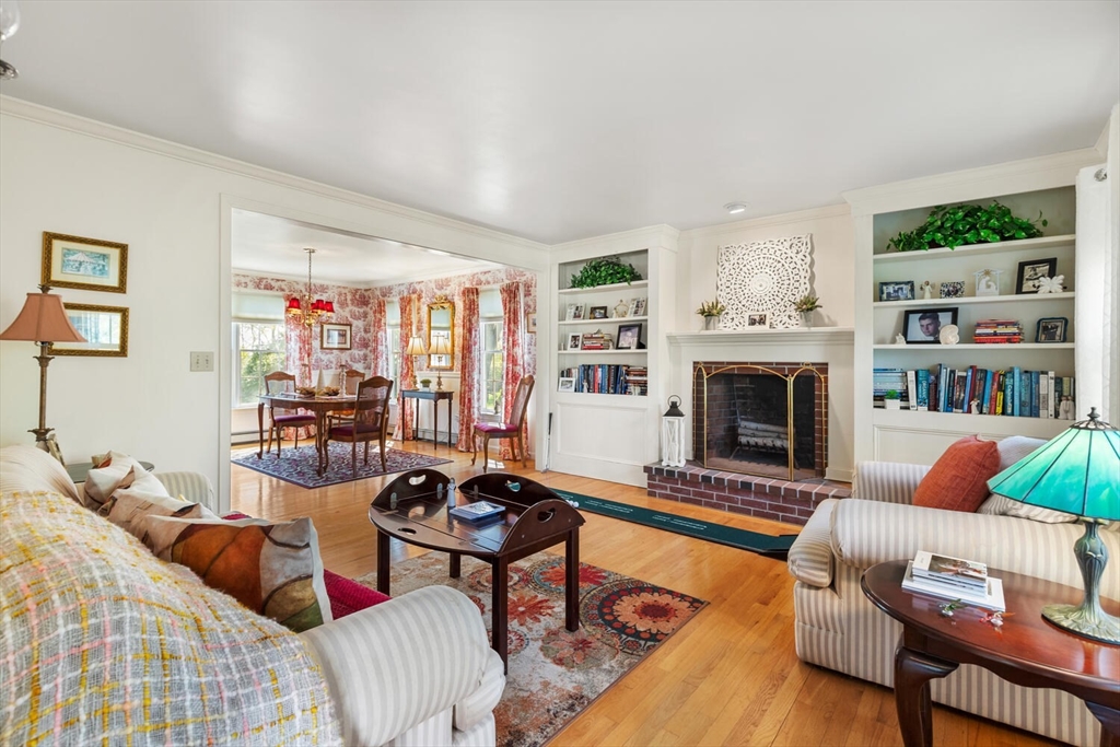 8 Oxford Road Gloucester, MA 01930 - Photo 7 of 35 a living room with furniture fireplace and a large window