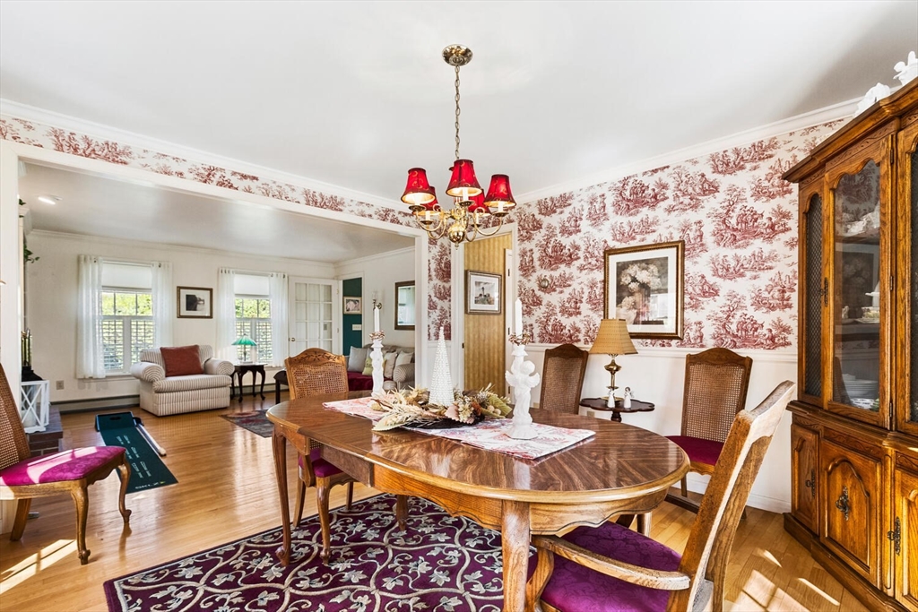 8 Oxford Road Gloucester, MA 01930 - Photo 10 of 35 a living room with patio furniture and a chandelier
