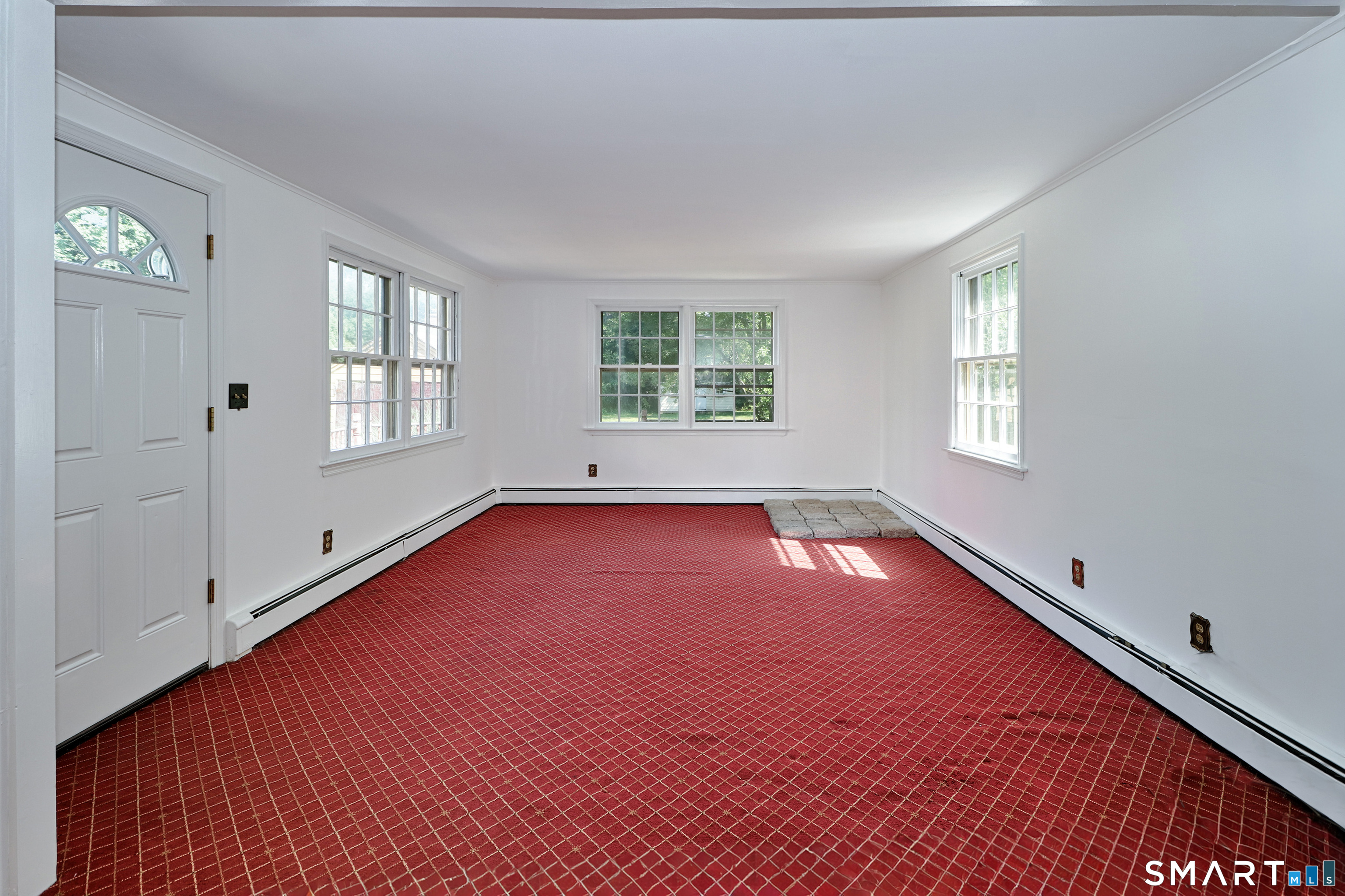104 Henderson Road Fairfield, CT 06824 - Photo 10 of 26 Versatile main floor 4th bedroom that is used as the family room.