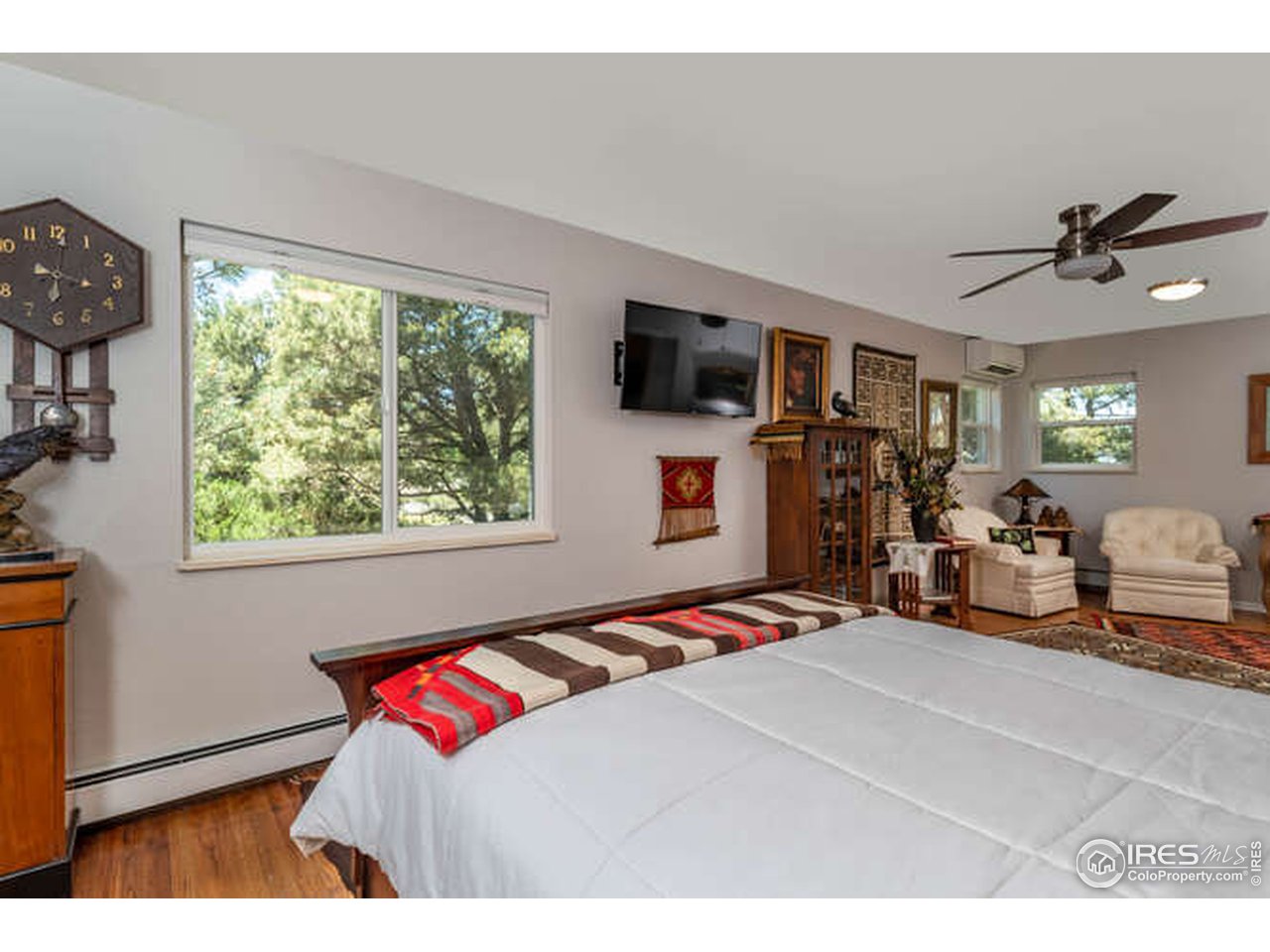 8829 Marathon Road Niwot, CO 80503 - Photo 11 of 33 Main bedroom with private sitting area and multiple closets