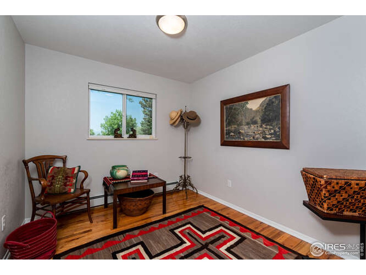 8829 Marathon Road Niwot, CO 80503 - Photo 14 of 33 An additional main level bedroom just waiting for your ideas on how to use it.