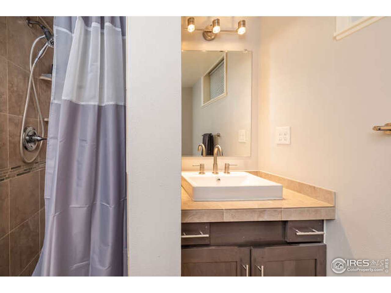 8829 Marathon Road Niwot, CO 80503 - Photo 24 of 33 Basement bathroom, updated and comfortable