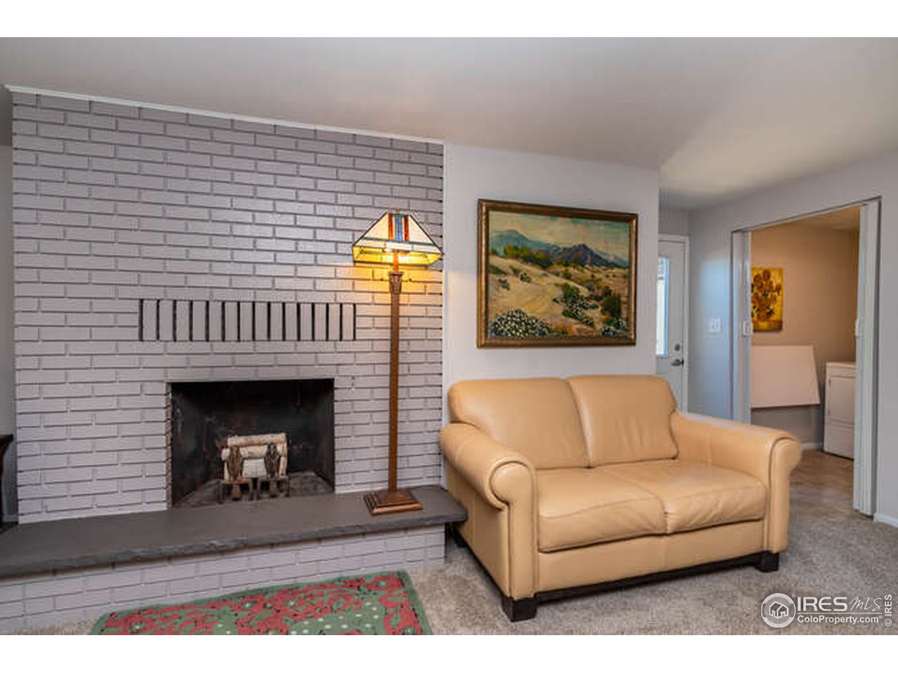 8829 Marathon Road Niwot, CO 80503 - Photo 26 of 33 Wood burning fireplace just waiting for you to read by it!