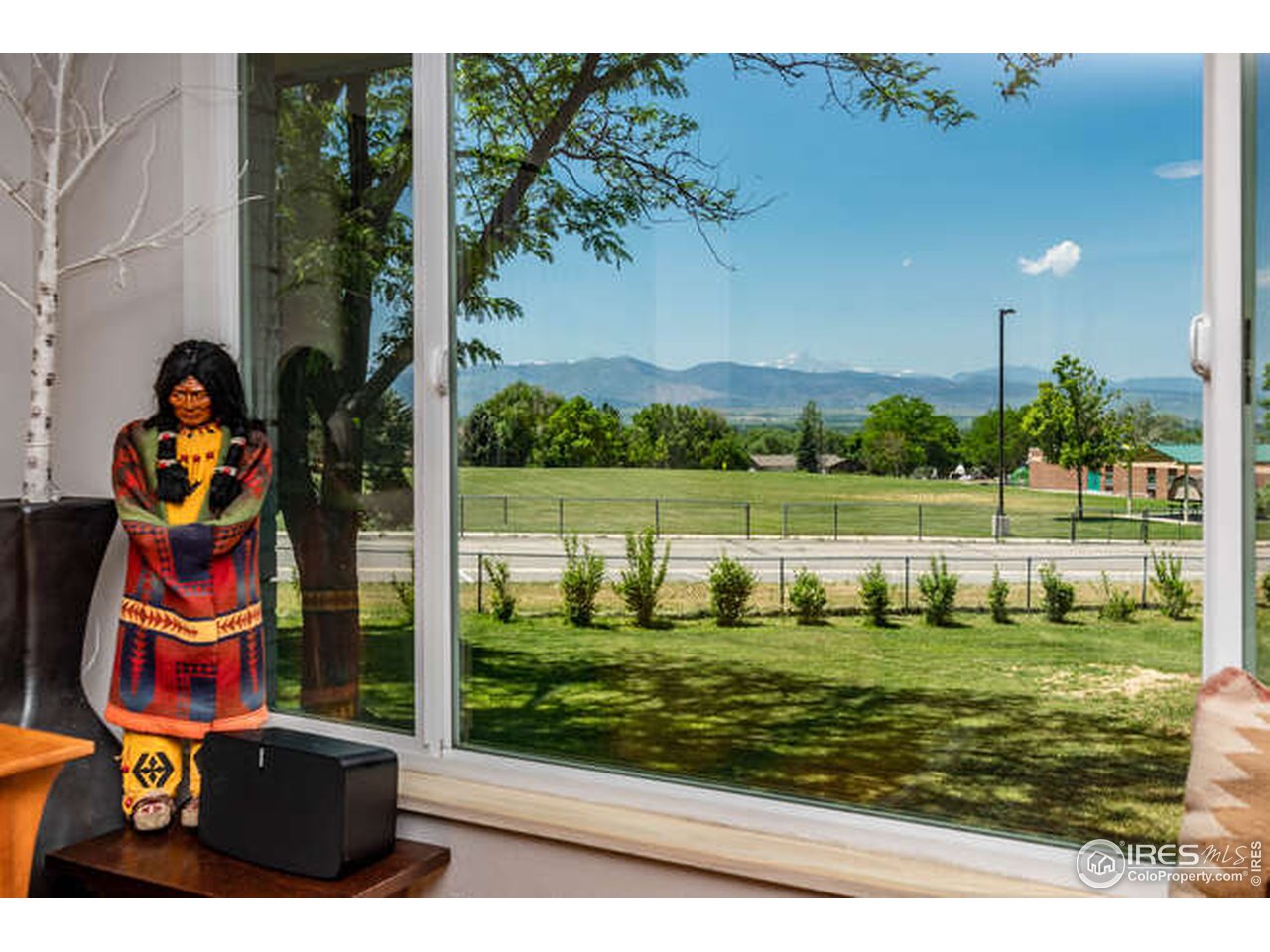 8829 Marathon Road Niwot, CO 80503 - Photo 8 of 33 Step up to this picture window to take in the incredible view of Long's Peak