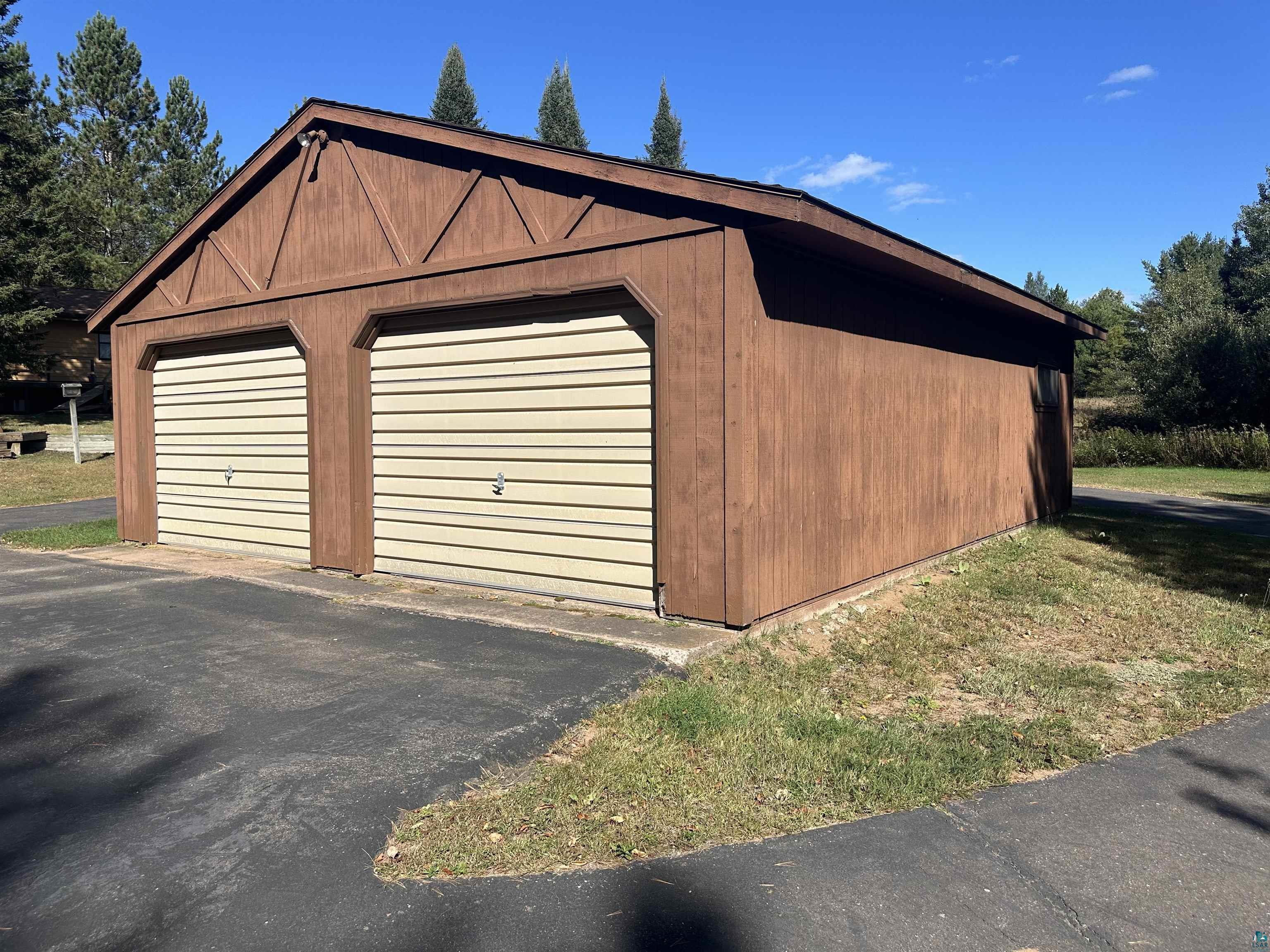 29020 Tulip Road Mellen, WI 54546 - Photo 3 of 12 Garage with wood walls