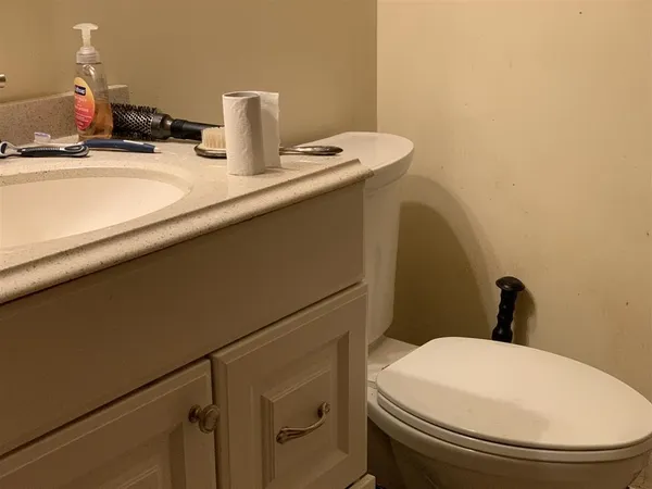 a bathroom with a sink and a toilet