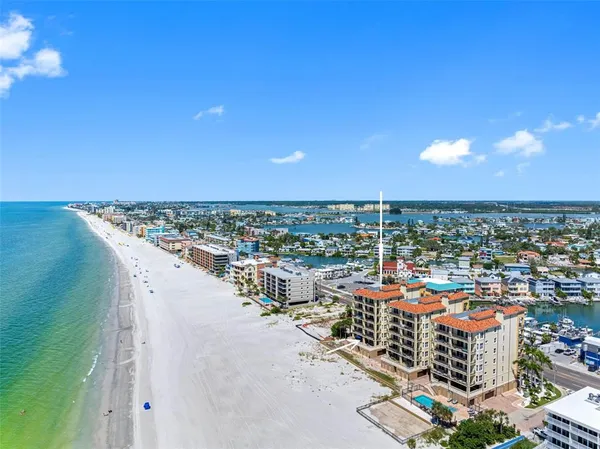 a view of a city with an ocean view